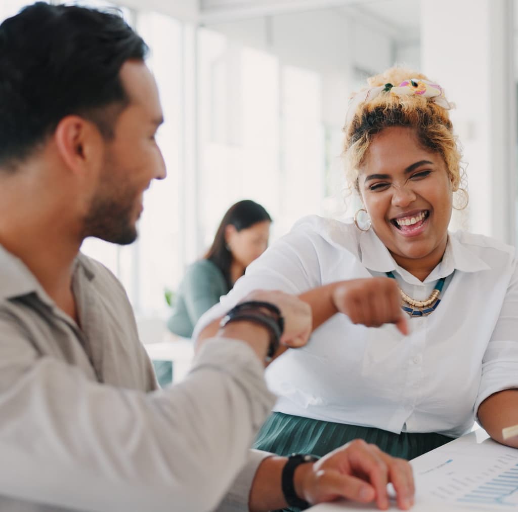 Coworkers enjoying fun in the office
